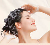 Olaplex No.4P Blonde Enhancer™ Toning Shampoo cheveux blonds, décolorés ou gris.